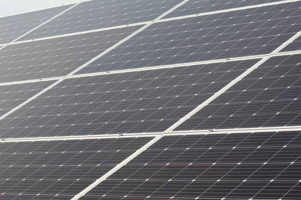 pexels-photo-7102661-7102661 Detailed close-up of solar panels harnessing sunlight for sustainable energy generation.